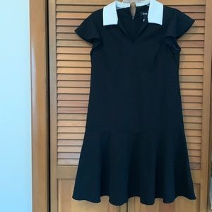 DKNY size 6, black with white collar. Zip back. Cap sleeves. Worn twice.